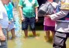 Polresta-Sidoarjo-Salurkan-Bantuan-Sembako-Untuk-Warga-Terdampak-Banjir-di-Dusun-Dodokan